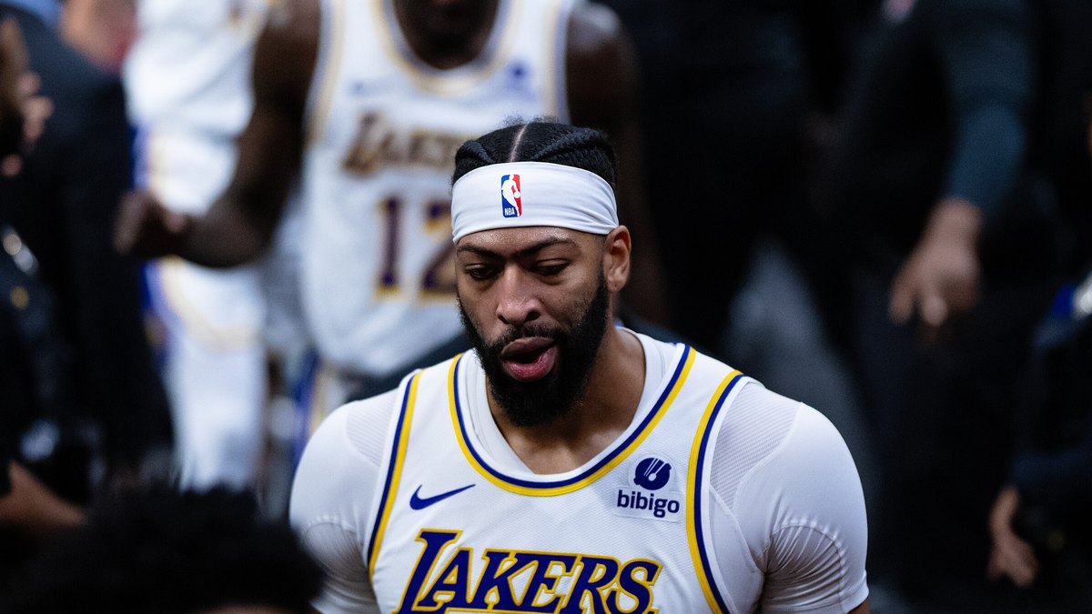 Anthony Davis in a white Los Angeles Lakers jersey and headband during a 2023 game