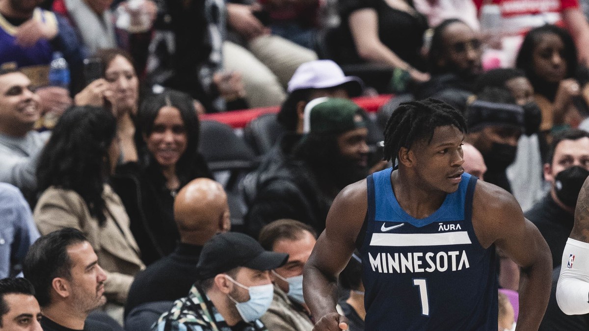 Anthony Edwards in a navy Minnesota Timberwolves No. 1 jersey on the court