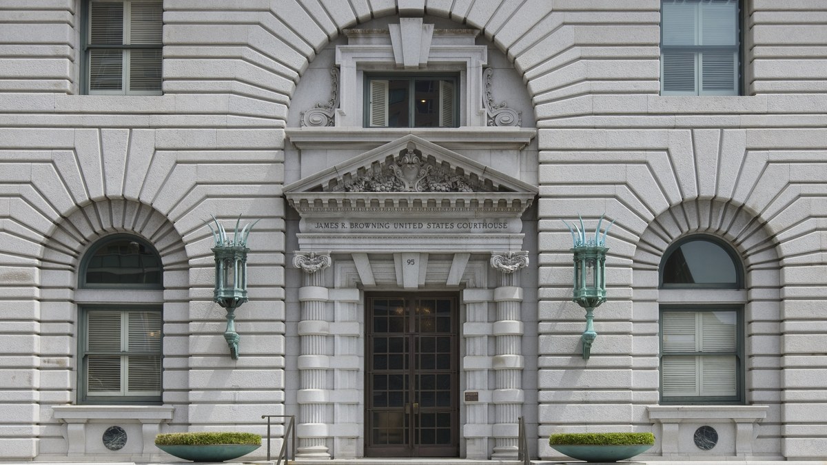 The carved stone main entrance of the James R. Browning U.S. Court of Appeals Building in San Francisco