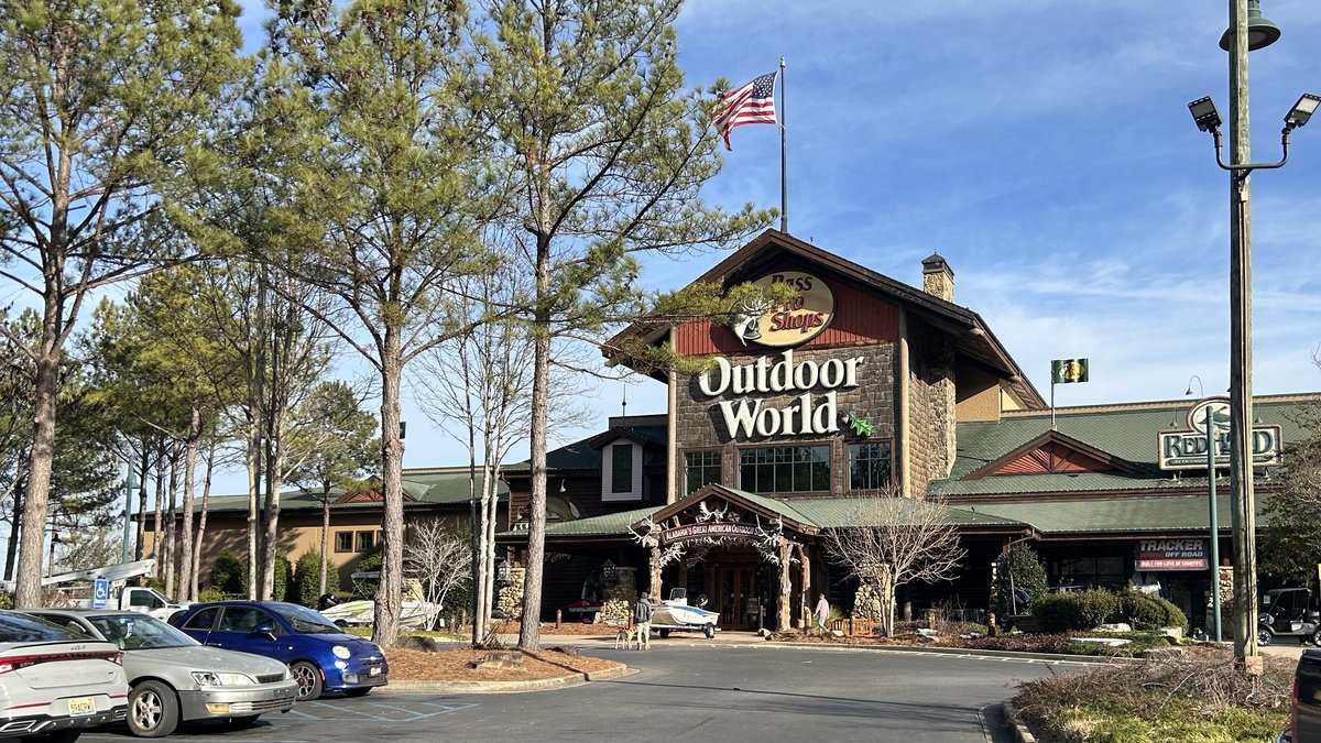 The Bass Pro Shops Outdoor World store in Leeds, Alabama on a sunny day