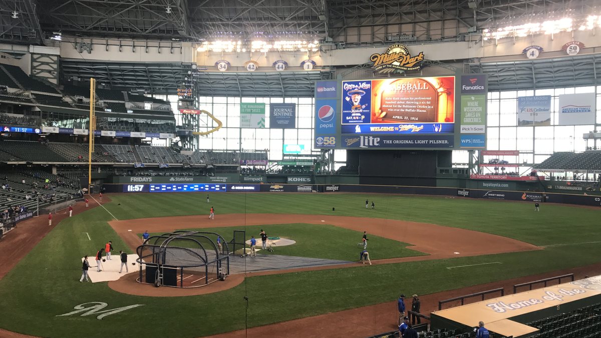 Inside the Brewers ballpark in Milwaukee with the roof closed and the field lit up