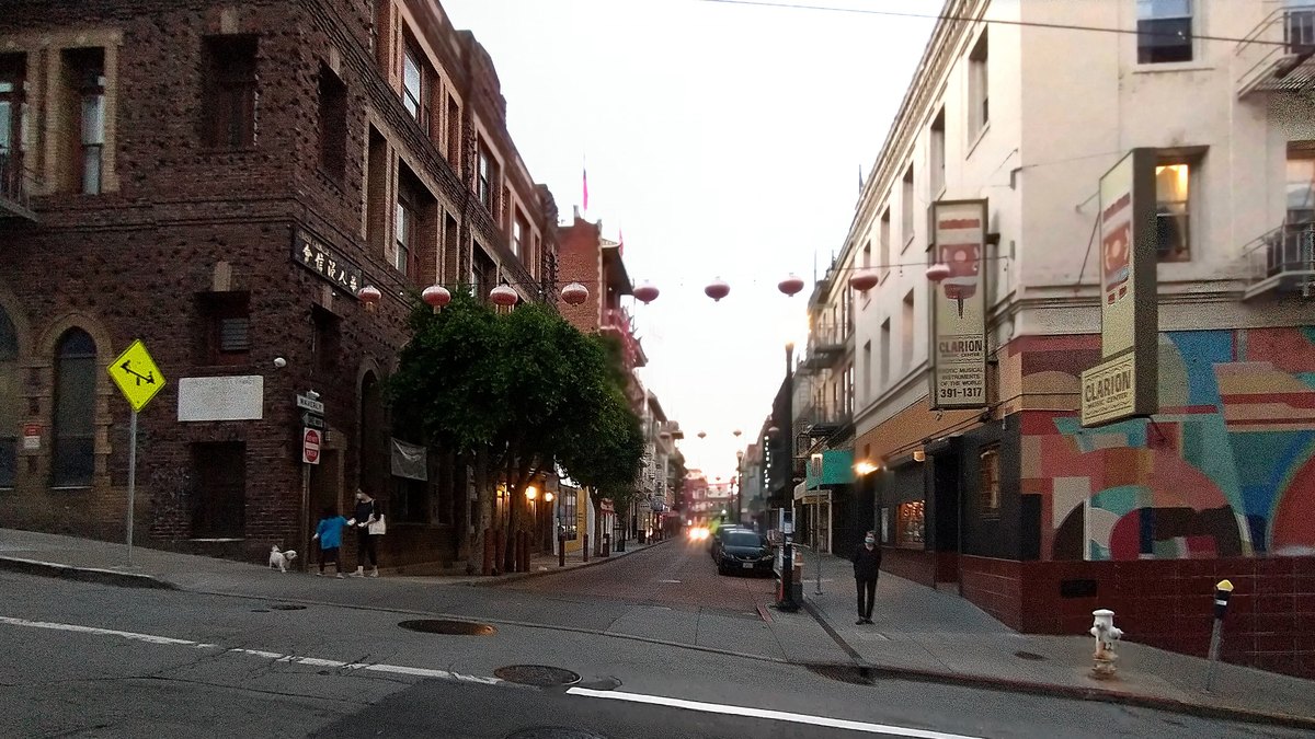 Painted balconies and strings of lanterns along Waverly Place in San Francisco's Chinatown