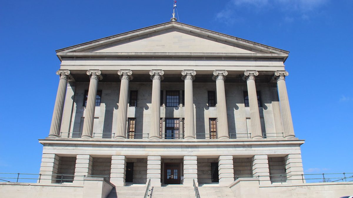 The Tennessee State Capitol in Nashville under a blue sky