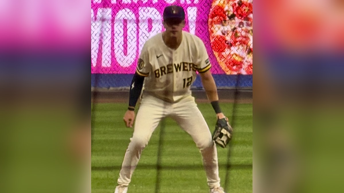 Cooper Pratt in a Milwaukee Brewers uniform at shortstop