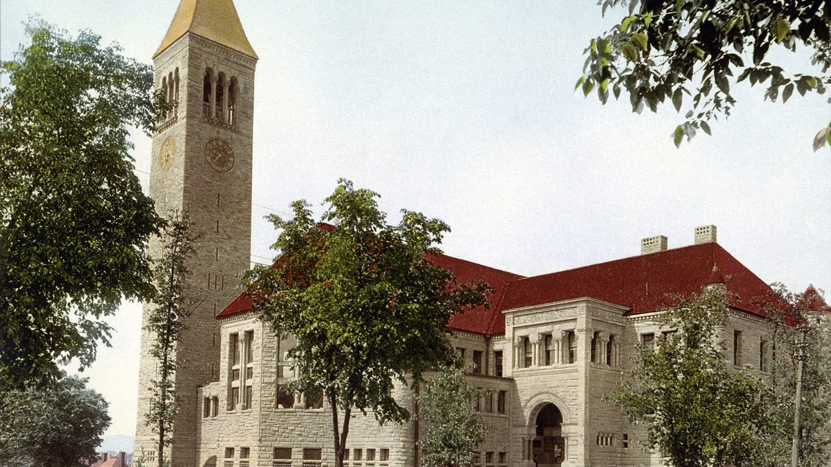 A vintage 1900 color print of the library and clock tower at Cornell University