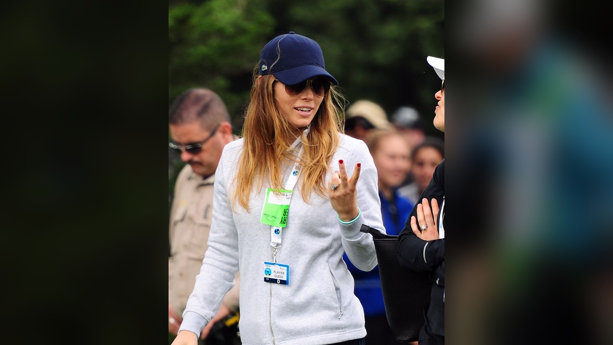 Jessica Biel in a navy cap at a golf tournament