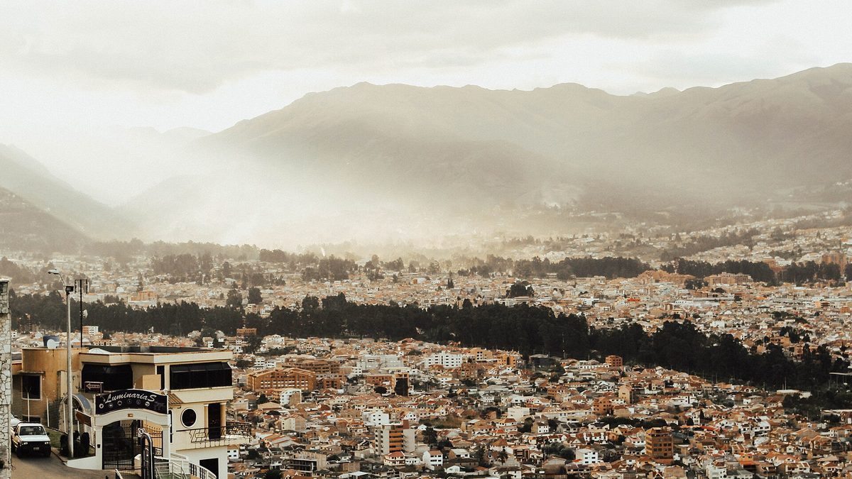The city of Cuenca in Ecuador spread across a valley below the mountains