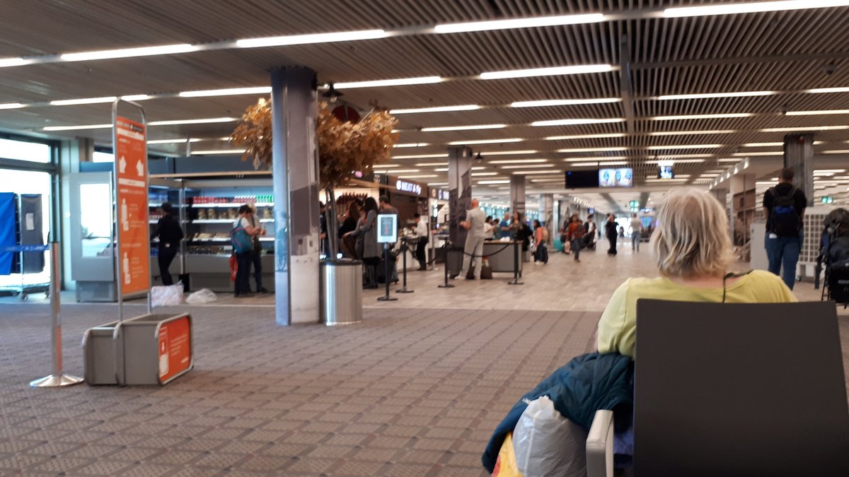 Travelers waiting inside a departure hall at Ben Gurion Airport in Israel