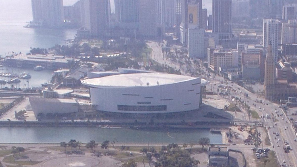 An aerial view of the Miami Heat's waterfront arena on Biscayne Boulevard with the downtown Miami skyline behind it