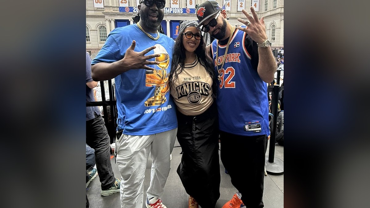 The Kid Mero and his Mornings with Mero co-hosts in Knicks gear outside New York City Hall