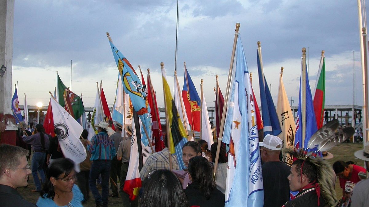 Tribal nation flags carried at a powwow in Eagle Butte, South Dakota, on the Cheyenne River Sioux Reservation