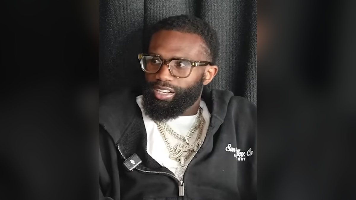 Boxer Jaron Ennis in glasses and a black hoodie speaks during a 2026 interview