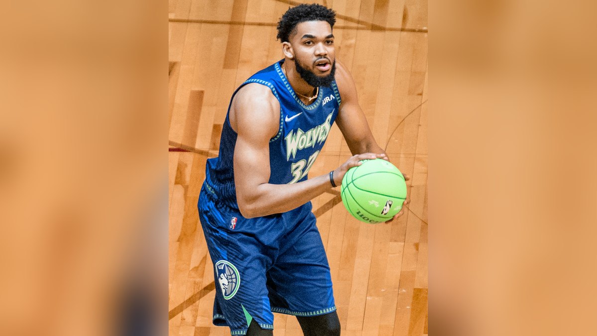 Karl-Anthony Towns dribbles a basketball at the 3-Point Contest
