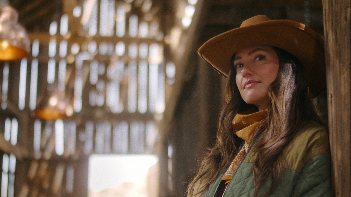 Minka Kelly in a still from the Netflix series Ransom Canyon