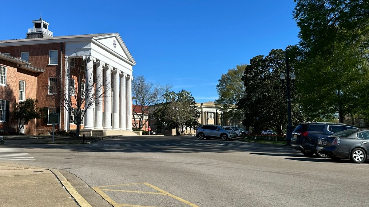 The columned Lyceum building on the University of Mississippi campus on a sunny day