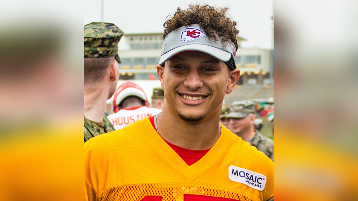 Patrick Mahomes in a Chiefs camouflage hoodie at a 2018 military appreciation event