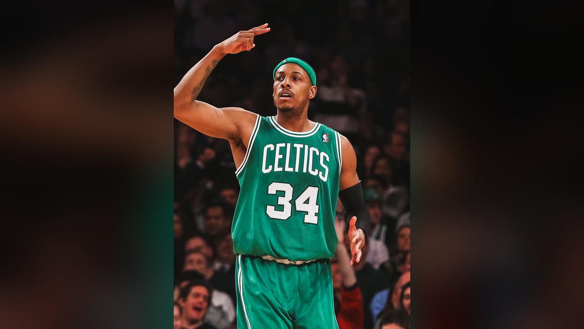 Paul Pierce in a green Celtics jersey No. 34 making a three gesture