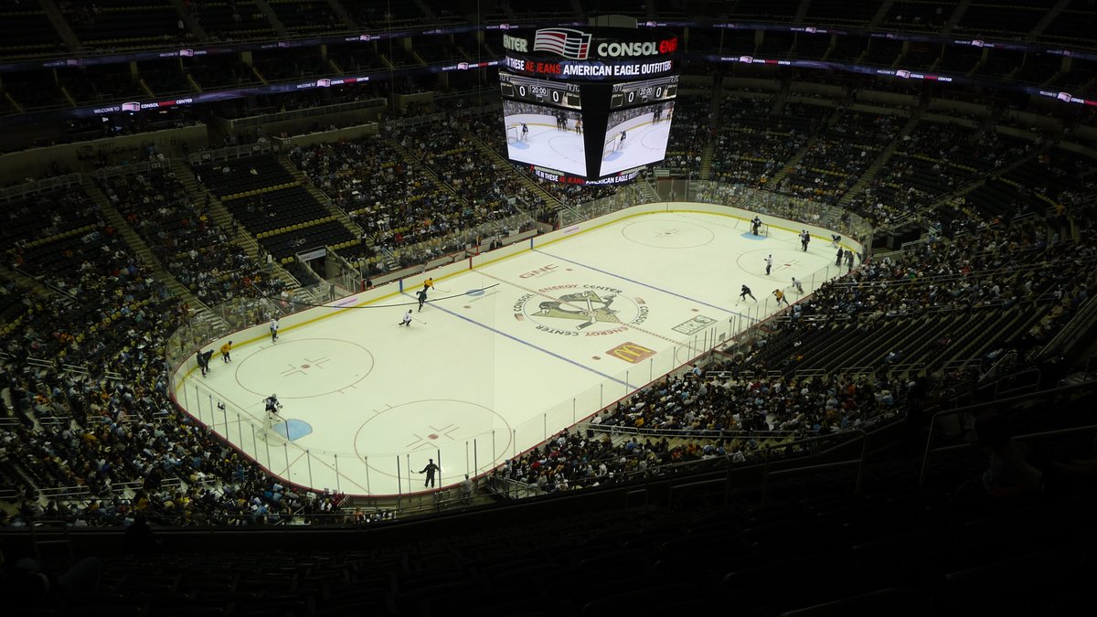 A hockey game in progress seen from the upper deck of the Pittsburgh Penguins' home arena