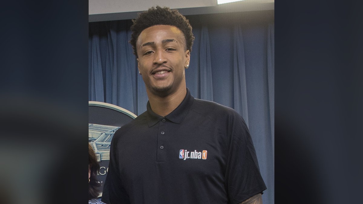 Pistons forward John Collins smiles at a 2019 event in Arlington, Virginia