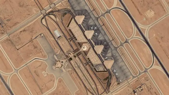 Satellite view of King Khalid International Airport in Riyadh showing its terminal complex and runways in the desert