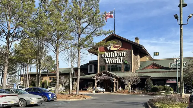 The Bass Pro Shops Outdoor World store in Leeds, Alabama on a sunny day