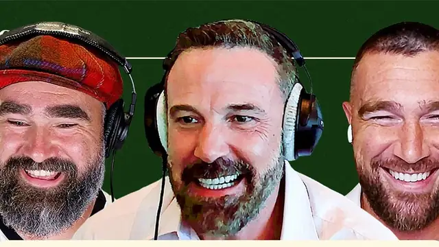 Ben Affleck laughing between Jason and Travis Kelce on their podcast
