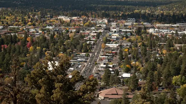 Homes and autumn trees lining the streets of Bend Oregon seen from Pilot Butte