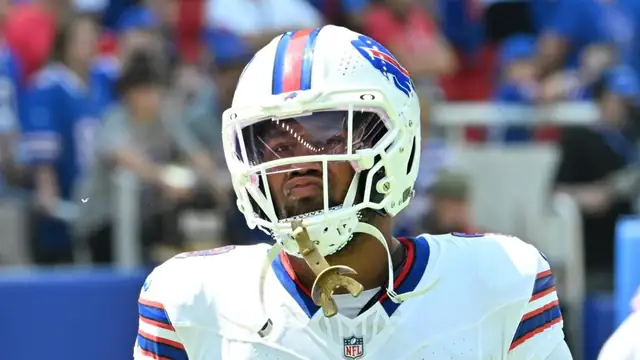 Bradley Chubb in a white Buffalo Bills helmet and jersey on the sideline