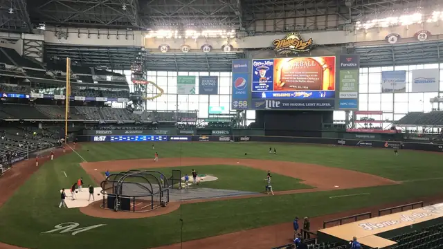 Inside the Brewers ballpark in Milwaukee with the roof closed and the field lit up