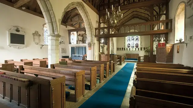 Wooden pews inside a quiet country church