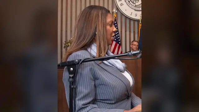 New York Attorney General Letitia James speaking at a podium