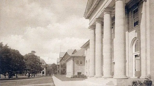 Vintage view of Cornell Arts Quadrangle with columned halls and trees