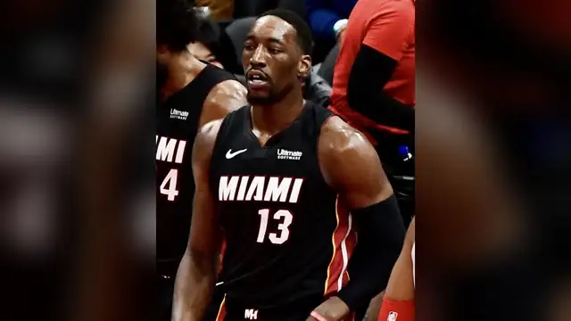 Bam Adebayo in a black Miami Heat No. 13 jersey on the court during a game