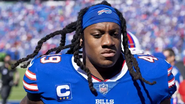 Linebacker Tremaine Edmunds with long locs and a blue headband in a No. 49 Buffalo Bills captain's jersey before joining the Giants