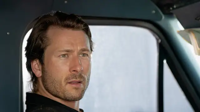 Glen Powell in a still from the Netflix film Hit Man