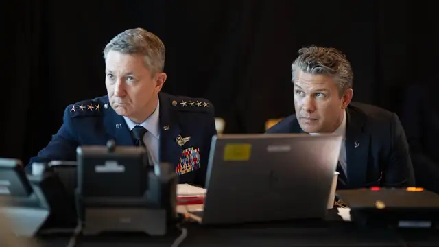 Gen. Dan Caine and Pete Hegseth look up at screens while monitoring the opening of the Iran war at Mar-a-Lago in March 2026