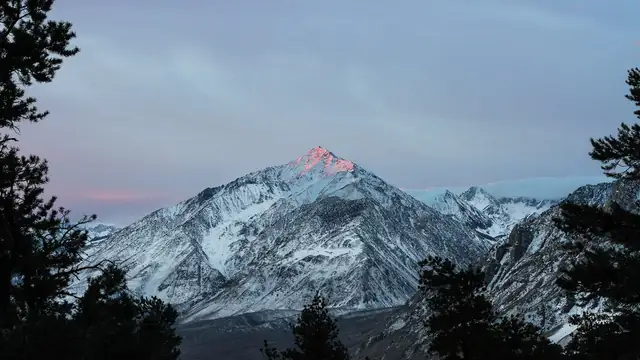 Snow-dusted peaks of California's Sierra Nevada at dawn