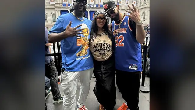 The Kid Mero and his Mornings with Mero co-hosts in Knicks gear outside New York City Hall