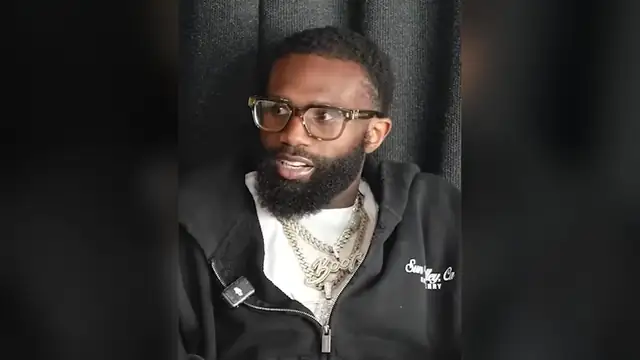 Boxer Jaron Ennis in glasses and a black hoodie speaks during a 2026 interview