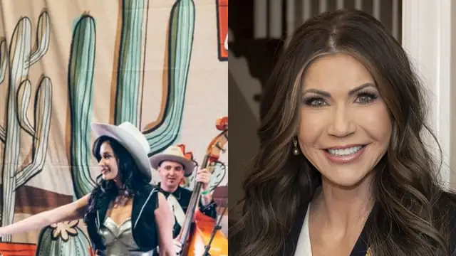 Kacey Musgraves in a white cowboy hat on stage beside a smiling Kristi Noem in a navy blazer