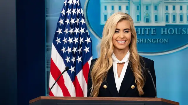 Katie Zacharia at the White House briefing room podium speaking to reporters
