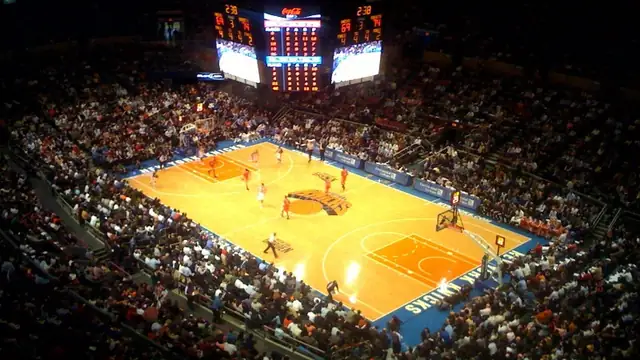 A packed Madison Square Garden crowd watches the Knicks play under the arena lights