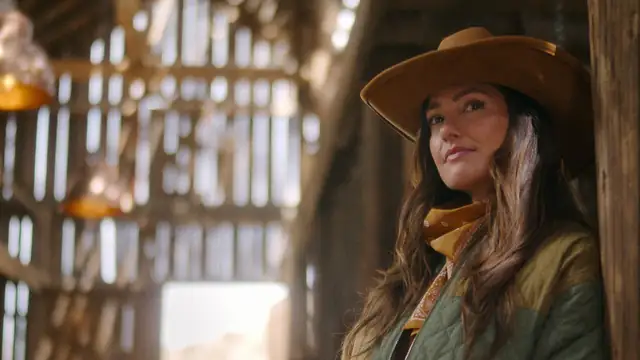Minka Kelly in a still from the Netflix series Ransom Canyon