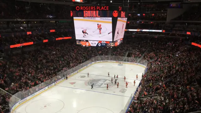 Fans in orange fill Rogers Place in Edmonton during an Oilers home game seen from the upper deck