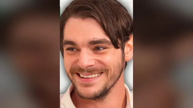 RJ Mitte smiling during a podcast interview
