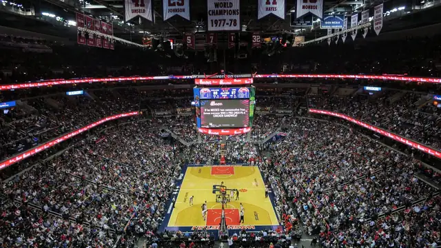 A packed crowd watches an NBA game at Capital One Arena, home of the Washington Wizards
