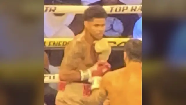 Shakur Stevenson with his gloves up in the ring during a fight