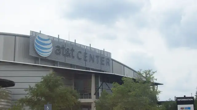 Fans fill the seats inside the AT&T Center arena in San Antonio under bright arena lights