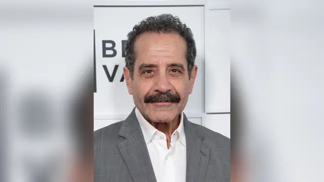 Tony Shalhoub in a gray suit at the Tribeca Festival