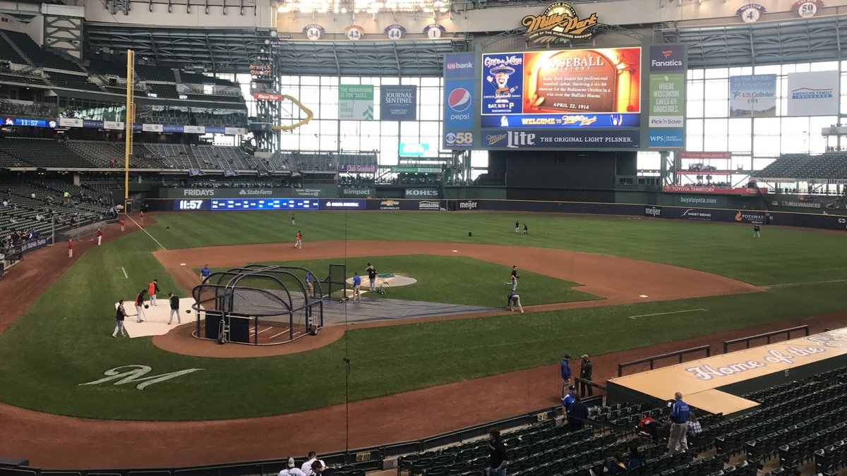 Batting practice before a game inside the Milwaukee Brewers' ballpark under its closed roof
